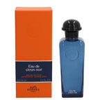 Blue perfume bottle with black cap and orange packaging featuring Hermes branding on a white background