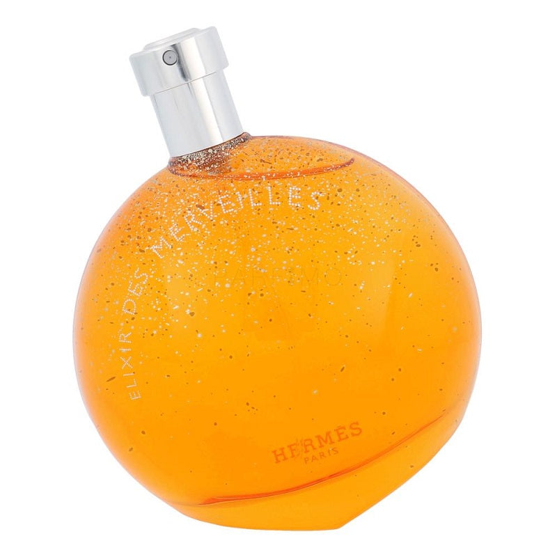 Orange perfume bottle with silver cap on a white background