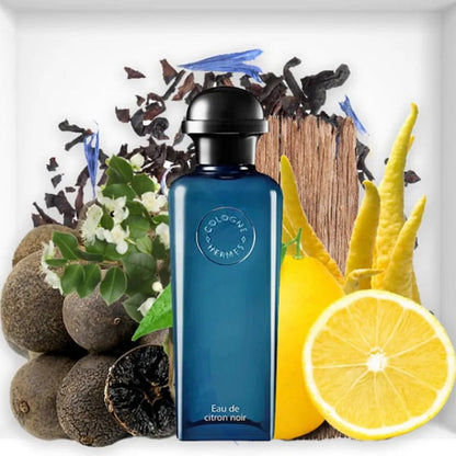 Blue cologne bottle with natural elements like lemon, vanilla, and wood on a white background
