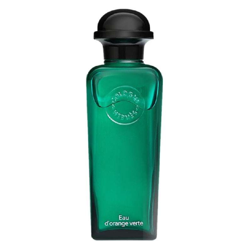 Green perfume bottle with black cap on a white background