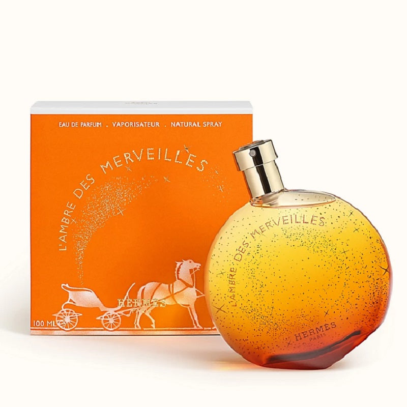 Hermes L'ambre des Merveilles perfume bottle and packaging on a white background