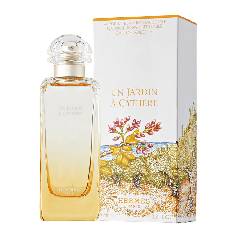 Hermes perfume bottle and packaging with floral design on a white background