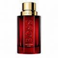 Hugo Boss The Scent Elixir for Him 100ml Parfum Intense deep-red lacquered glass bottle with faceted contours, bold BOSS lettering and satin warm-gold cap on a clean white background.