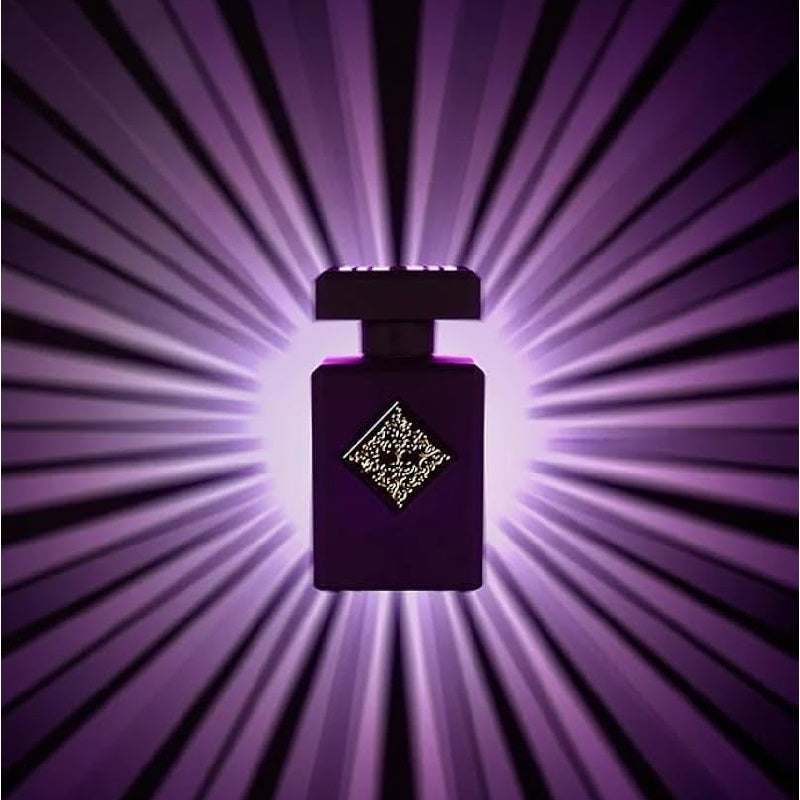 Purple perfume bottle with a starburst effect on a purple background