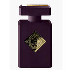 Purple perfume bottle with gold decorative emblem on a white background
