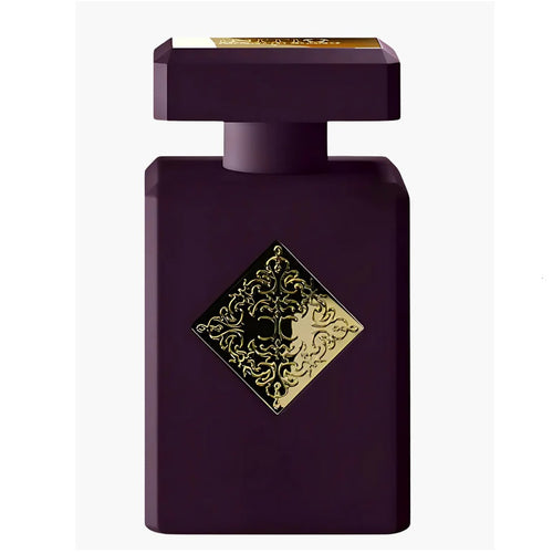 Purple perfume bottle with gold decorative emblem on a white background