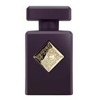 Purple perfume bottle with gold decorative label on a white background