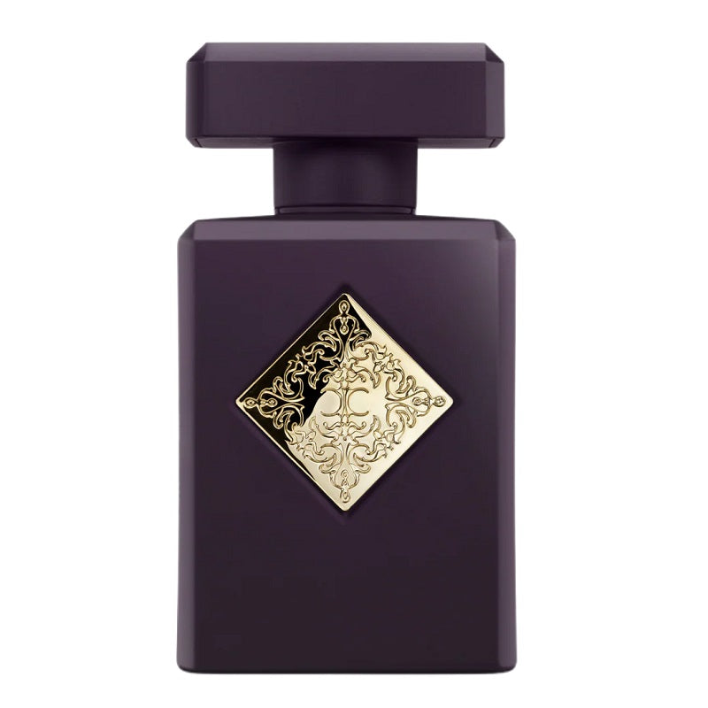 Purple perfume bottle with gold decorative label on a white background