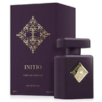 Purple Initio perfume bottle and packaging with gold decorative elements on a white background