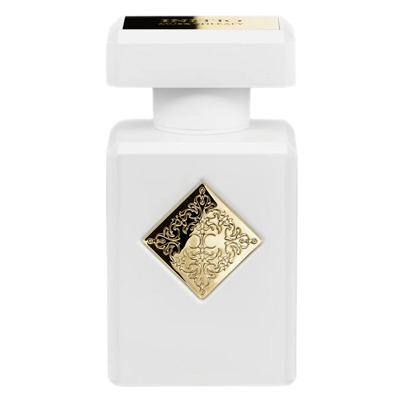 White perfume bottle with gold decorative label on a white background