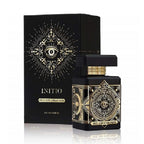 Black and gold Initio perfume bottle and packaging on a white background