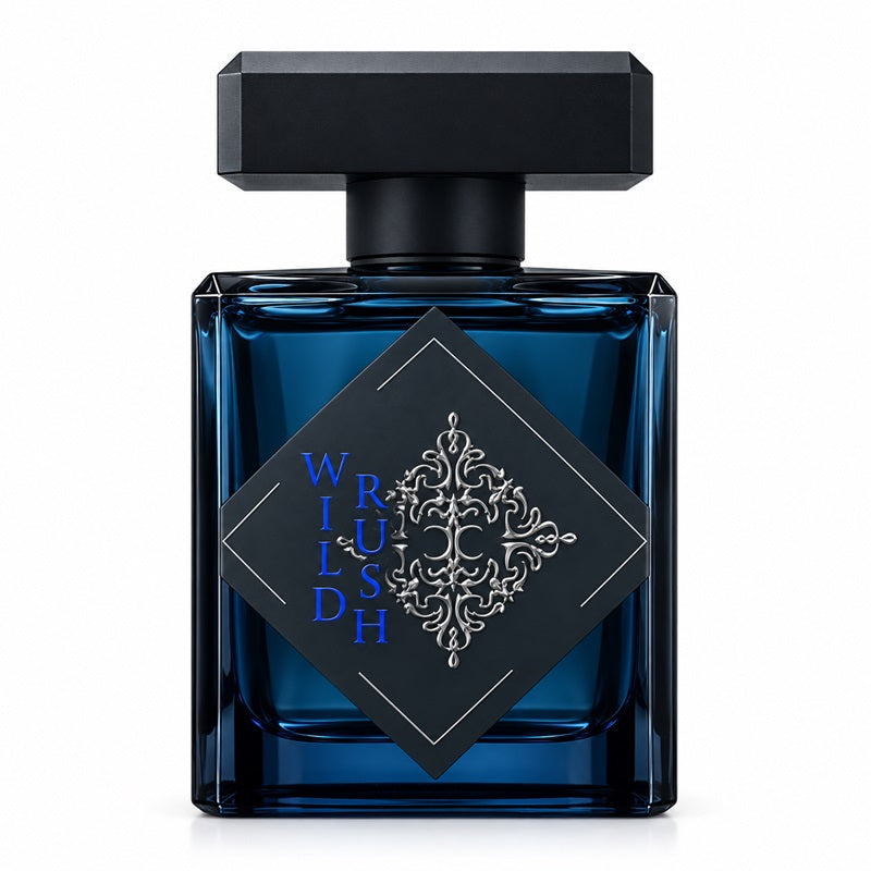 A deep blue Wild Rush bottle with a black cap and a black diamond label bearing silver ornament and blue Wild Rush lettering.