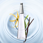 A clear glass perfume bottle with a silver cap, labeled 'L'EAU D'OPSI', centered over a light blue water ripple background. A yellow opal leaf and vanilla beans are placed around the bottle as styled props.