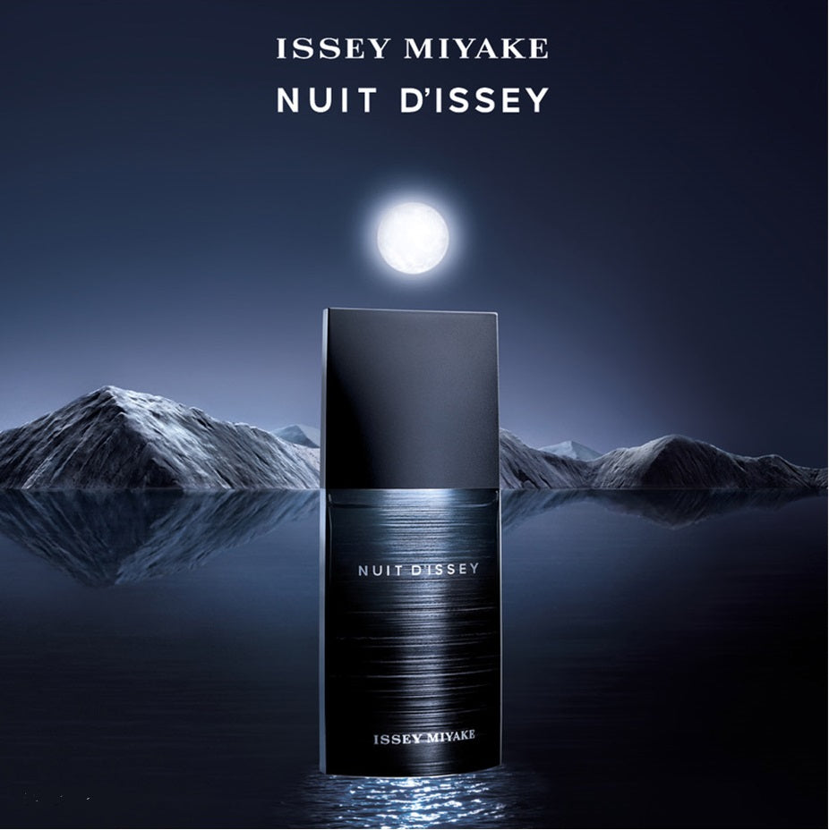 Issey Miyake Nuit d'Issey perfume bottle with mountain and moon background