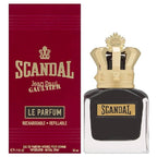 Scandal Le Parfum by Jean Paul Gaultier, with a black bottle and a gold-colored cap, alongside a red packaging box with the brand name and fragrance details.