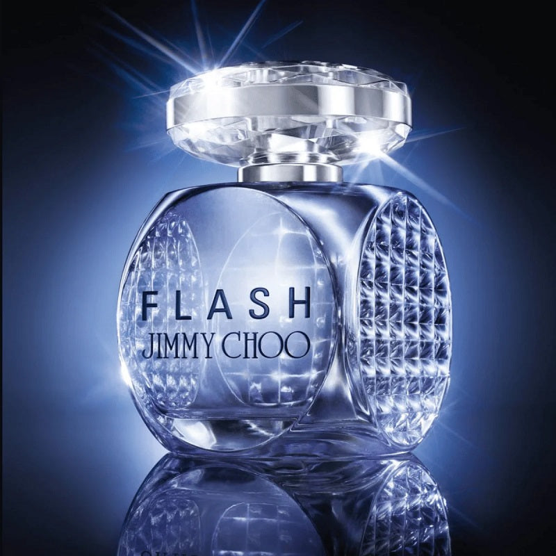 Jimmy Choo Flash perfume bottle on a reflective surface with a dark background.