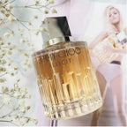 Perfume bottle with blurred woman and flowers in the background