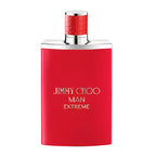 Red perfume bottle with silver cap on a white background