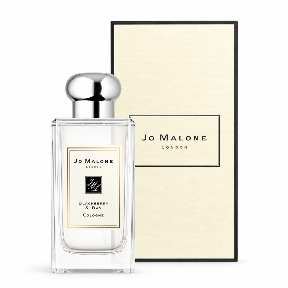 Jo Malone London Blackberry & Bay Cologne in a clear glass bottle with a silver cap, shown next to its cream-colored packaging box on a white background.