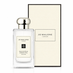 Jo Malone London English Pear & Sweet Pea Cologne in a clear rectangular glass bottle with a silver cap, shown next to its cream-colored textured packaging box.