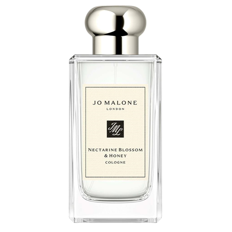 Jo Malone London Nectarine Blossom & Honey Cologne in a clear glass bottle with a silver cap and cream-colored label.