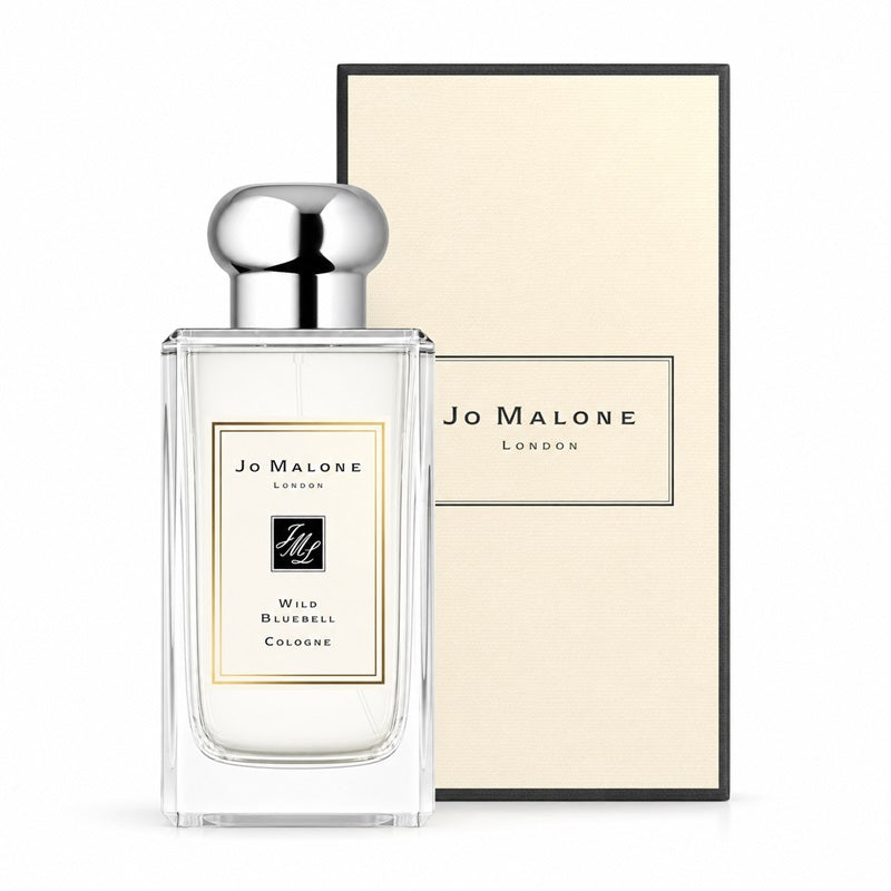 Jo Malone London Wild Bluerbell Cologne perfume bottle in front of its cream-colored packaging box, on a clean white background.
