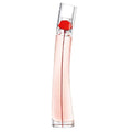 Perfume bottle with a red cap on a white background