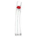Clear glass bottle with a red flower on a white background