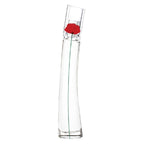 Clear glass bottle with a red flower on a white background