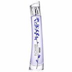 Kenzo Flower Ikebana Indigo 75ml Eau de Parfum tall curved glass bottle with pale indigo fragrance, silver sculptural cap and delicate blue floral stem on a clean white background