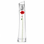 A clear glass perfume bottle with a silver spray mechanism and a single red poppy flower with a green stem printed or embedded on the front, set against a plain white background.