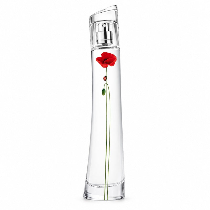 A clear glass perfume bottle with a silver spray mechanism and a single red poppy flower with a green stem printed or embedded on the front, set against a plain white background.
