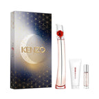 Kenzo Flower L'Absolu 100ml (3pc-Set) Eau de Parfum by Kenzo, displayed with a 100ml perfume bottle, a 10ml perfume spray, and a 75ml scented body lotion, all presented in front of a gift box with stars and moon design.