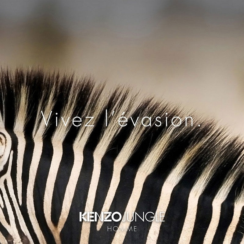 Close-up of a zebra's striped pattern with 'Vivez l'évasion' text and Kenzo Jungle branding.