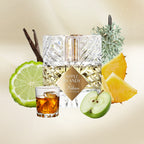Kilian Apple Brandy perfume bottle with fruit and a glass of brandy on a beige background