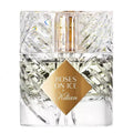 A clear glass bottle of 'Roses on Ice' Eau de Parfum by Kilian with a gold label.
