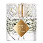A clear glass bottle of 'Roses on Ice' Eau de Parfum by Kilian with a gold label.