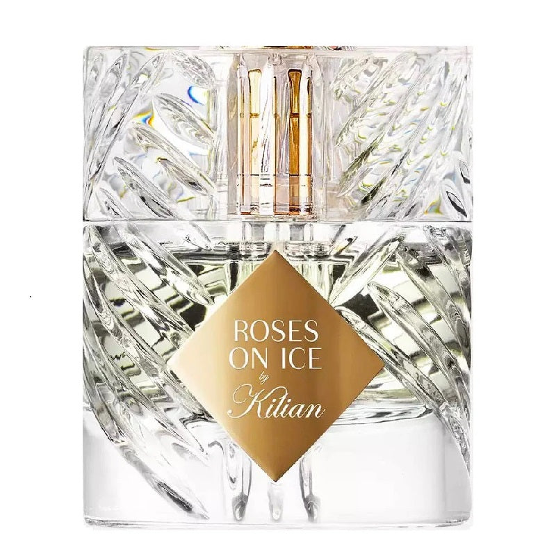 A clear glass bottle of 'Roses on Ice' Eau de Parfum by Kilian with a gold label.