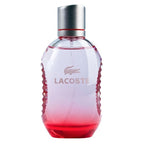 Lacoste perfume bottle with gradient design on a white background