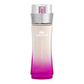 Lacoste perfume bottle with gradient design on a white background