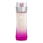 Lacoste perfume bottle with gradient design on a white background