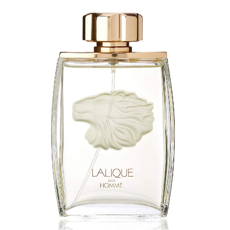 Lalique perfume bottle with gold cap and lion head design on a white background