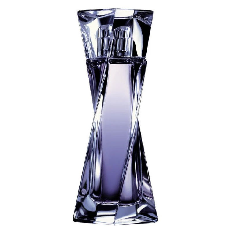 Clear glass perfume bottle on a white background