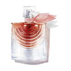 Perfume bottle with a floral design on a white background