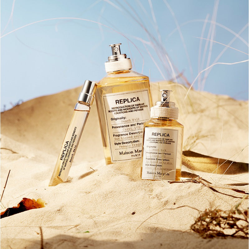 Beach Walk by replica, maison margiela image of bottles surrendered by sandy beach