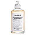 Maison Margiela Replica perfume bottle on a white background