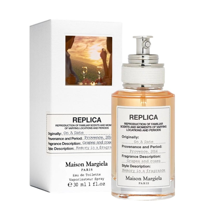 Maison Margiela perfume bottle and its packaging box on a white background
