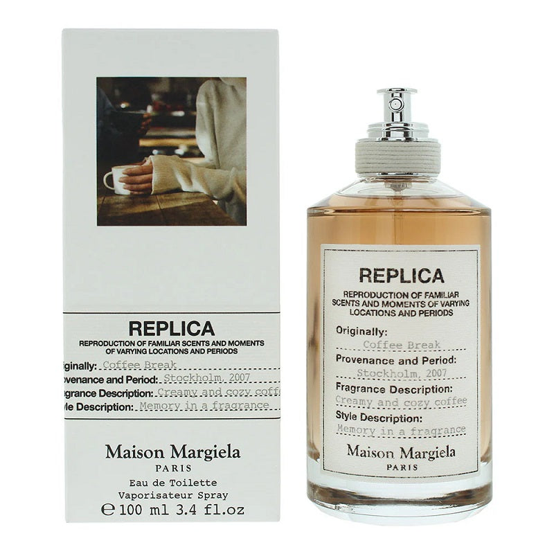 Maison Margiela Replica perfume bottle and its packaging box on a white background.
