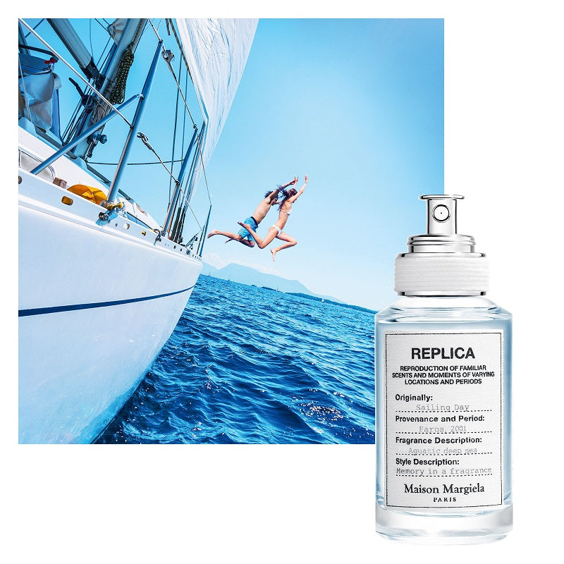 Maison Margiela rperfume bottle with a sailboat and people diving into water in the background