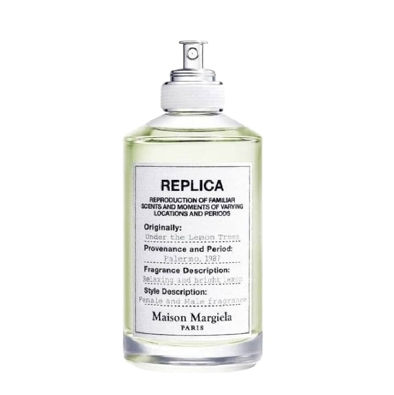 A spray bottle of Maison Margiela Replica Under the Lemon Trees Eau de Toilette, indicating the fragrance is a crisp citrus scent with notes of lime, green tea, and white musk.
